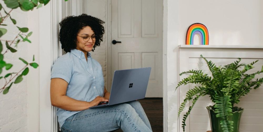 UK parents reviewing a nursery comparison checklist at home while comparing nursery prices and reviews